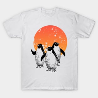 Funny penguins in the sun T-Shirt